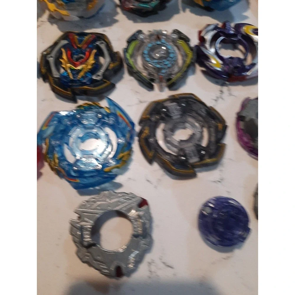 Lot Of 8 Beyblade And Different Parts